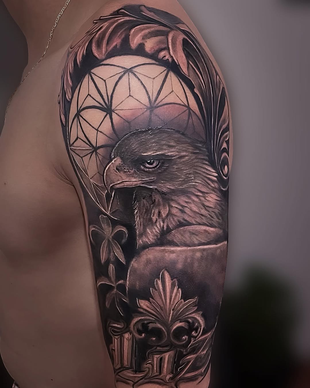 Eagle realism tattoo with geometry